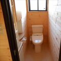 防音室で趣味を楽しむ二階建てのトイレ|鉾田市の注文住宅,ログハウスのような木の家を低価格で建てるならエイ・ワン