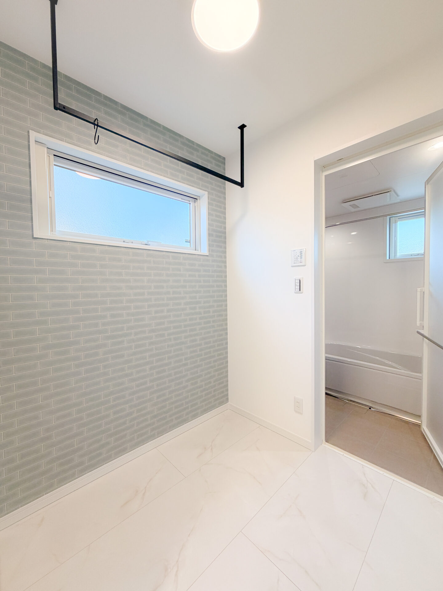 広めに確保した、着替えや洗濯がしやすい脱衣室